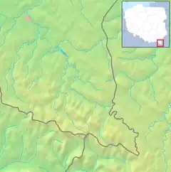 Mapa konturowa Bieszczadów Zachodnich, na dole znajduje się czarny trójkącik z opisem „Wielka Rawka”