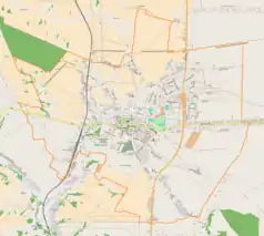 Mapa konturowa Miechowa, w centrum znajduje się punkt z opisem „Parafia Grobu Bożego”