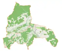 Mapa konturowa gminy Milówka, w centrum znajduje się punkt z opisem „Parafia Najświętszego Imienia Maryi w Kamesznicy”