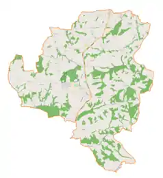 Mapa konturowa gminy Mogilany, blisko centrum na lewo znajduje się punkt z opisem „Zespół dworski w Chorowicach”