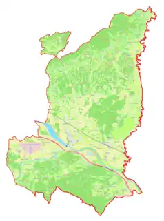 Mapa konturowa gminy Brežice, blisko centrum na dole znajduje się punkt z opisem „Brežice”