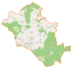 Mapa konturowa gminy Murowana Goślina, blisko centrum na lewo u góry znajduje się punkt z opisem „Kościół św. Tymoteusza w Białężynie”