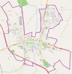 Mapa konturowa Nidzicy, po lewej znajduje się punkt z opisem „Parafia Miłosierdzia Bożego”