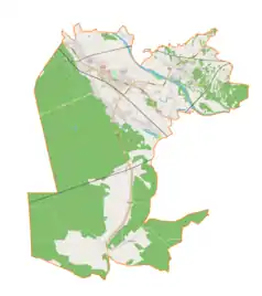 Mapa konturowa gminy Nisko, blisko centrum na prawo u góry znajduje się punkt z opisem „Wolina”