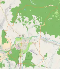 Mapa konturowa Nowego Targu, blisko centrum na dole znajduje się punkt z opisem „Muzeum Regionalne w Nowym Targu”