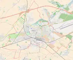 Mapa konturowa Oleśnicy, blisko centrum na lewo u góry znajduje się punkt z opisem „Rataje”