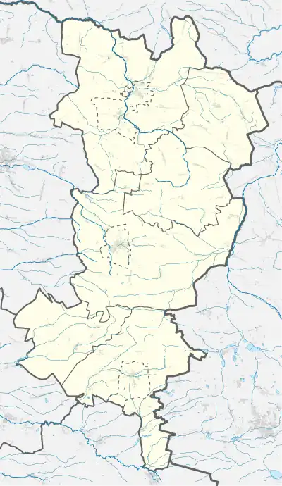 Mapa konturowa powiatu oleskiego, na dole po lewej znajduje się punkt z opisem „Pałac w Zębowicach”