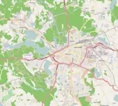 Mapa konturowa Olsztyna, w centrum znajduje się punkt z opisem „Zamek Kapituły Warmińskiejw Olsztynie”