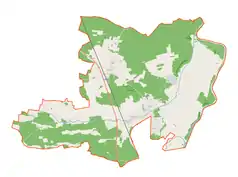 Mapa konturowa gminy Otyń, blisko centrum po prawej na dole znajduje się ikonka zamku z wieżą z opisem „Zamek w Otyniu”