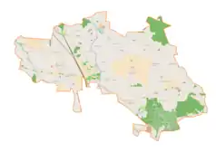 Mapa konturowa gminy wiejskiej Ozorków, blisko centrum na lewo znajduje się punkt z opisem „Wróblew”