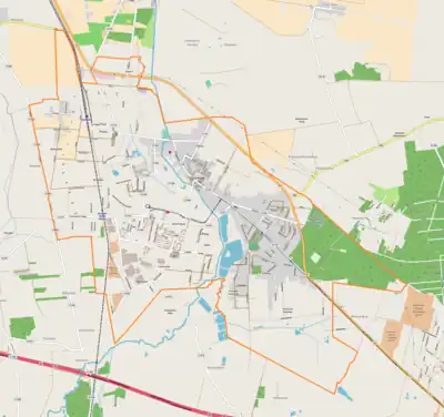 Mapa konturowa Ozorkowa, u góry po lewej znajduje się punkt z opisem „Ozorków”