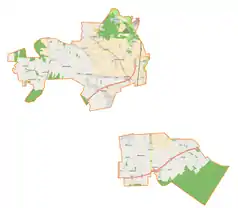 Mapa konturowa gminy wiejskiej Pabianice, blisko centrum na lewo u góry znajduje się punkt z opisem „Kudrowice”