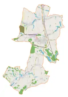 Mapa konturowa gminy Pawłowice, na dole znajduje się punkt z opisem „Parafia Narodzenia NMP”