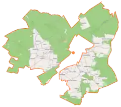 Mapa konturowa gminy wiejskiej Pionki, blisko centrum na lewo znajduje się punkt z opisem „Jaśce”