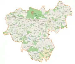 Mapa konturowa powiatu łukowskiego, w centrum znajduje się punkt z opisem „Parafia św. Marii Magdaleny”