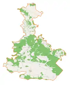 Mapa konturowa powiatu biłgorajskiego, blisko centrum na lewo znajduje się punkt z opisem „Dąbrowica”