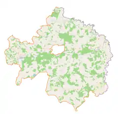 Mapa konturowa powiatu bialskiego, blisko centrum u góry znajduje się punkt z opisem „Roskosz”