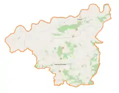 Mapa konturowa powiatu dąbrowskiego, po prawej znajduje się punkt z opisem „Cmentarz wojenny nr 244 – Narożniki”