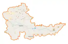 Mapa konturowa powiatu proszowickiego, w centrum znajduje się punkt z opisem „Ostrów”