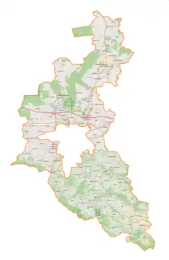 Mapa konturowa powiatu rzeszowskiego, blisko górnej krawiędzi nieco na prawo znajduje się punkt z opisem „Kamień”