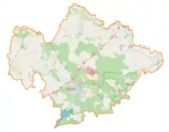 Mapa konturowa powiatu tomaszowskiego, u góry po lewej znajduje się punkt z opisem „Łaznów”