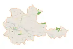 Mapa konturowa gminy Proszowice, u góry znajduje się punkt z opisem „Ostrów”