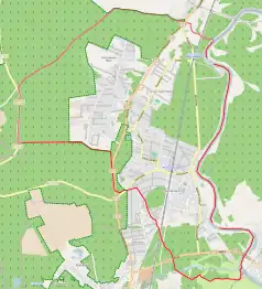 Mapa konturowa Puszczykowa, blisko centrum na prawo znajduje się punkt z opisem „Nadwarciański Bór Sosnowy”