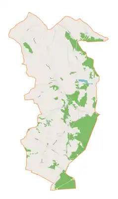 Mapa konturowa gminy Radgoszcz, po prawej znajduje się punkt z opisem „Cmentarz wojenny nr 244 – Narożniki”