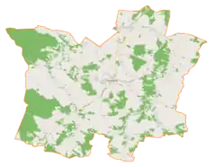 Mapa konturowa gminy Radomyśl Wielki, na dole po lewej znajduje się punkt z opisem „Janowiec”