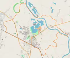 Mapa konturowa Radymna, blisko centrum na lewo znajduje się punkt z opisem „Parafia św. Wawrzyńcaw Radymnie”