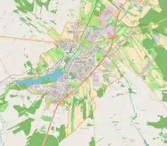 Mapa konturowa Rawy Mazowieckiej, blisko centrum u góry znajduje się punkt z opisem „Parafia Ewangelicko-Augsburska w Rawie Mazowieckiej”