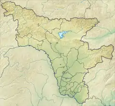 Mapa konturowa obwodu amurskiego, u góry nieco na prawo znajduje się punkt z opisem „Park Narodowy „Tokinsko-Stanowoj””