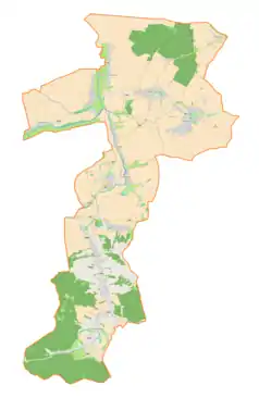 Mapa konturowa gminy Roźwienica, blisko górnej krawiędzi po prawej znajduje się punkt z opisem „Mokra”