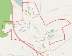 Mapa konturowa Rydzyny, blisko centrum po prawej na dole znajduje się punkt z opisem „Parafia św. Stanisława Biskupa”