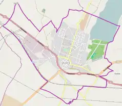 Mapa konturowa Słupcy, blisko centrum na dole znajduje się punkt z opisem „Parafia św. Wawrzyńca”