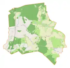 Mapa konturowa gminy Słupia Konecka, blisko centrum u góry znajduje się punkt z opisem „Olszówka Pilczycka”