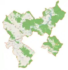 Mapa konturowa gminy wiejskiej Sanok, blisko centrum na lewo znajduje się punkt z opisem „Czerteż, cerkiew”