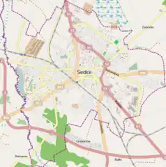 Mapa konturowa Siedlec, blisko centrum u góry znajduje się punkt z opisem „Uniwersytet w Siedlcach”