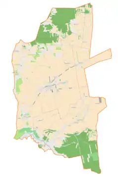 Mapa konturowa gminy Skomlin, blisko centrum po lewej na dole znajduje się punkt z opisem „Bojanów”