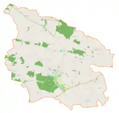 Mapa konturowa gminy Solec-Zdrój, blisko centrum na dole znajduje się punkt z opisem „Solec-Zdrój”