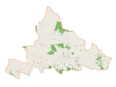 Mapa konturowa gminy Sulmierzyce, blisko centrum po lewej na dole znajduje się punkt z opisem „Piekary”