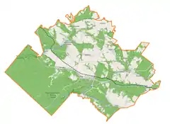 Mapa konturowa gminy Susiec, blisko centrum na prawo znajduje się punkt z opisem „źródło”, natomiast na dole znajduje się punkt z opisem „ujście”