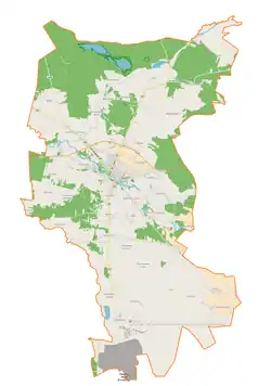 Mapa konturowa gminy Szczerców, po lewej znajduje się punkt z opisem „Dzbanki”