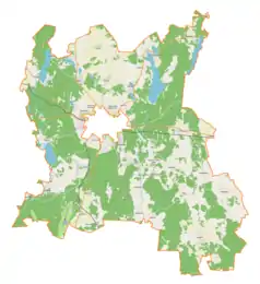 Mapa konturowa gminy wiejskiej Szczytno, u góry znajduje się punkt z opisem „Romany”