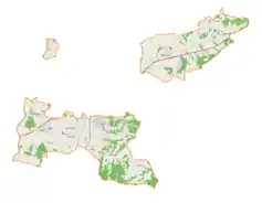 Mapa konturowa gminy wiejskiej Tarnów, blisko centrum po lewej na dole znajduje się punkt z opisem „Cmentarz wojenny nr 180Tarnowiec”