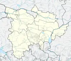 Mapa konturowa powiatu tarnogórskiego, blisko centrum na dole znajduje się punkt z opisem „Stowarzyszenie Miłośników Ziemi Tarnogórskiej”