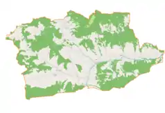 Mapa konturowa gminy Tokarnia, w centrum znajduje się punkt z opisem „Parafia Matki Bożej Śnieżnej”