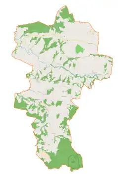 Mapa konturowa gminy Trzciana, u góry znajduje się punkt z opisem „Cmentarz wojenny nr 310 – Leszczyna”