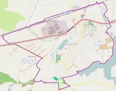 Mapa konturowa Trzemeszna, u góry po prawej znajduje się owalna plamka nieco zaostrzona i wystająca na lewo w swoim dolnym rogu z opisem „Jezioro Bystrzyca”