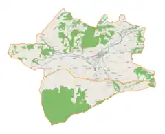 Mapa konturowa gminy Tymbark, na dole znajduje się punkt z opisem „źródło”, natomiast blisko centrum na lewo znajduje się punkt z opisem „ujście”